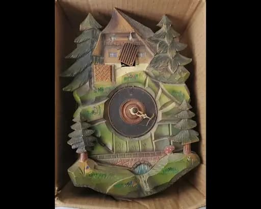 Vintage carved wood chalet clock