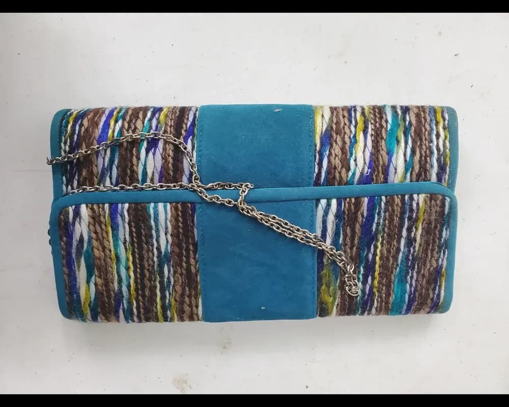 La Regale woven suede clutch