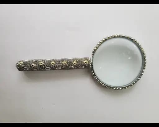 Beaded handle metal magnifying glass