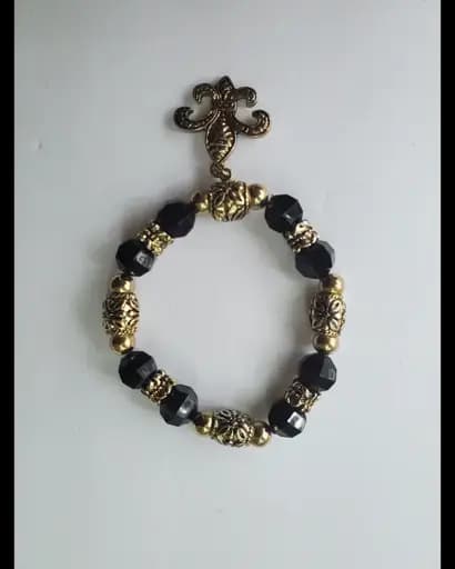 Black bead fleur de lis bracelet