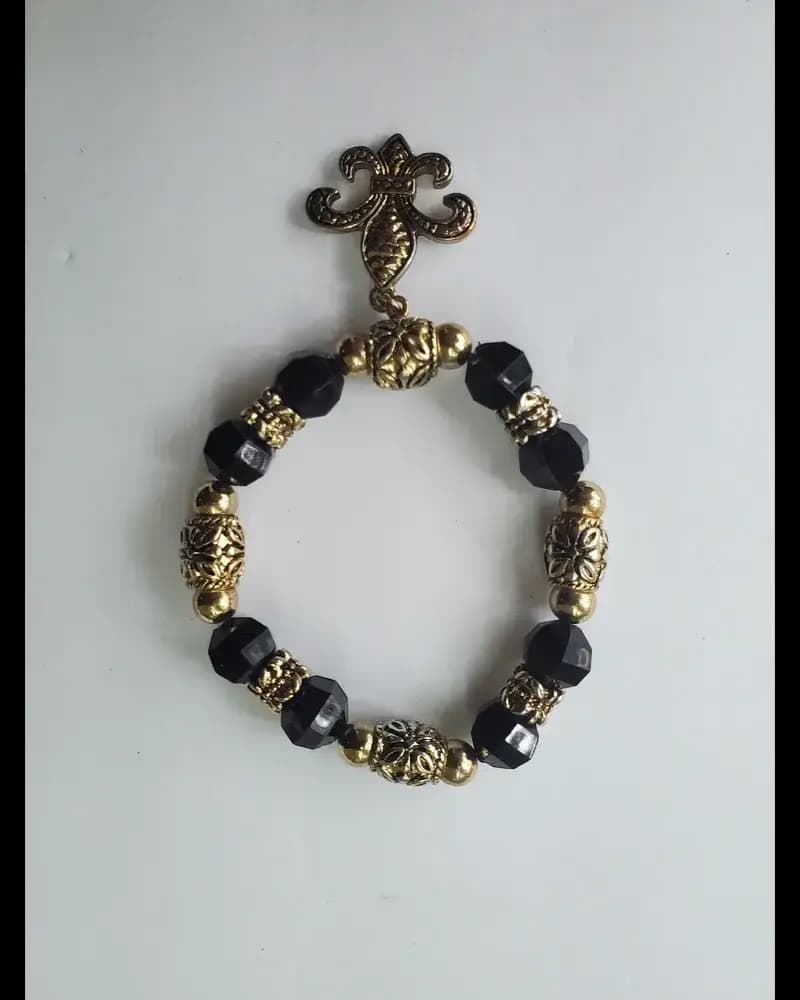 Black bead fleur de lis bracelet