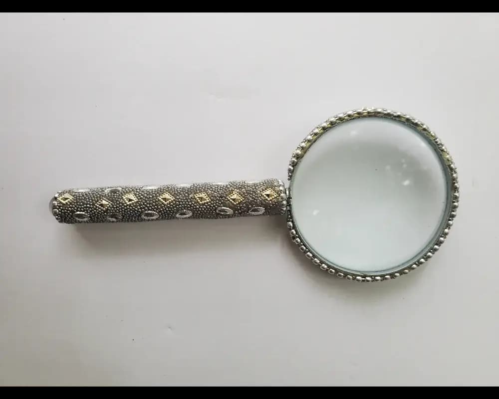 Beaded handle metal magnifying glass