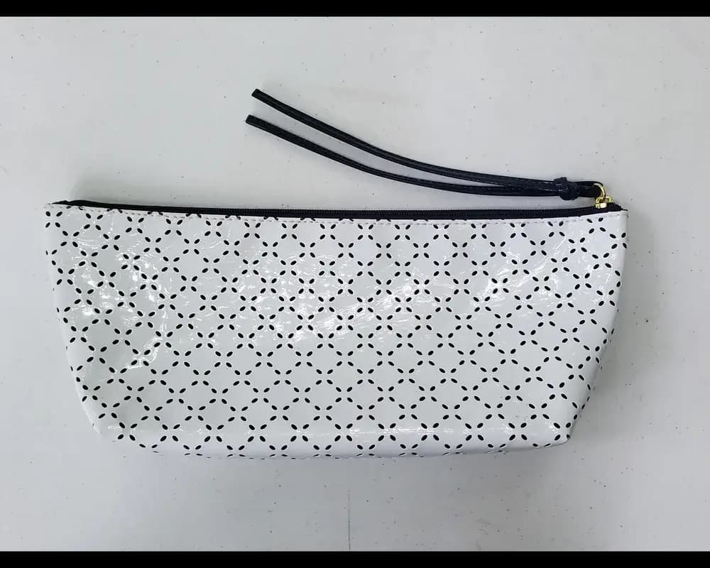 Henri Bendel perforated wristlet bag