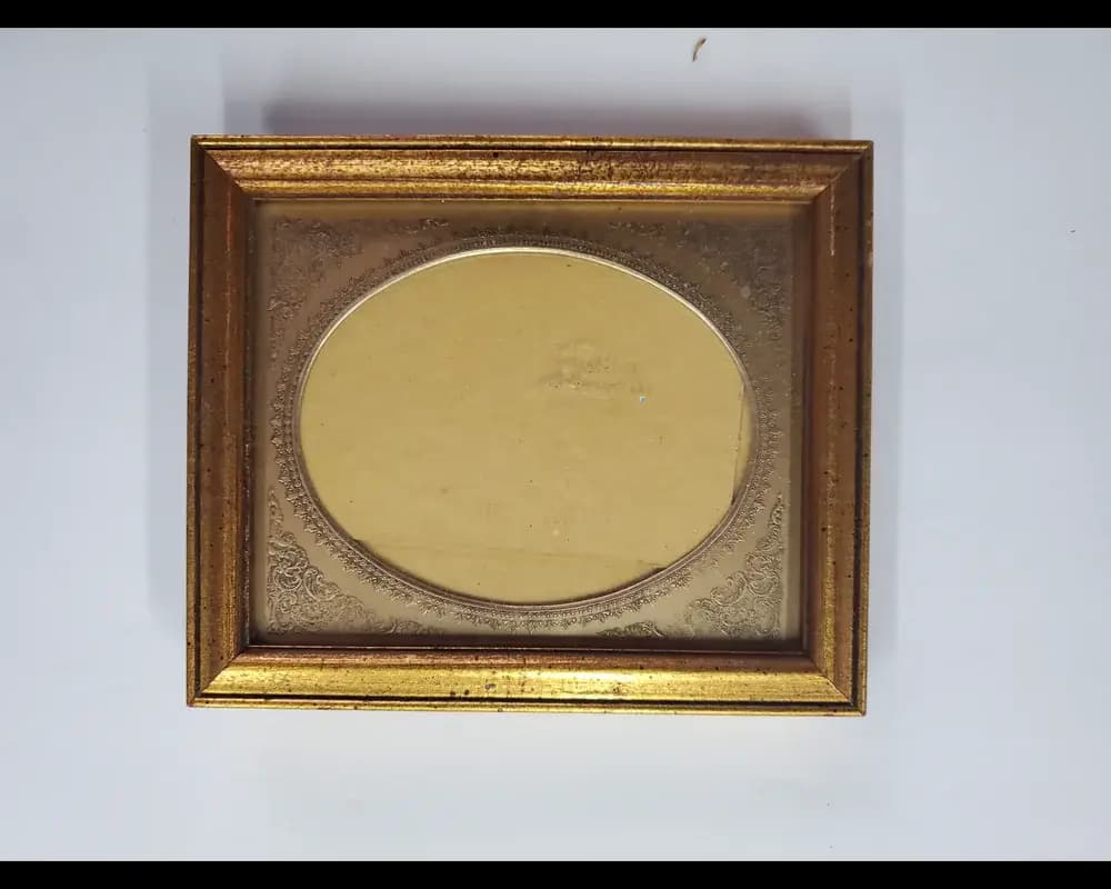 Vintage ornate oval gold frame