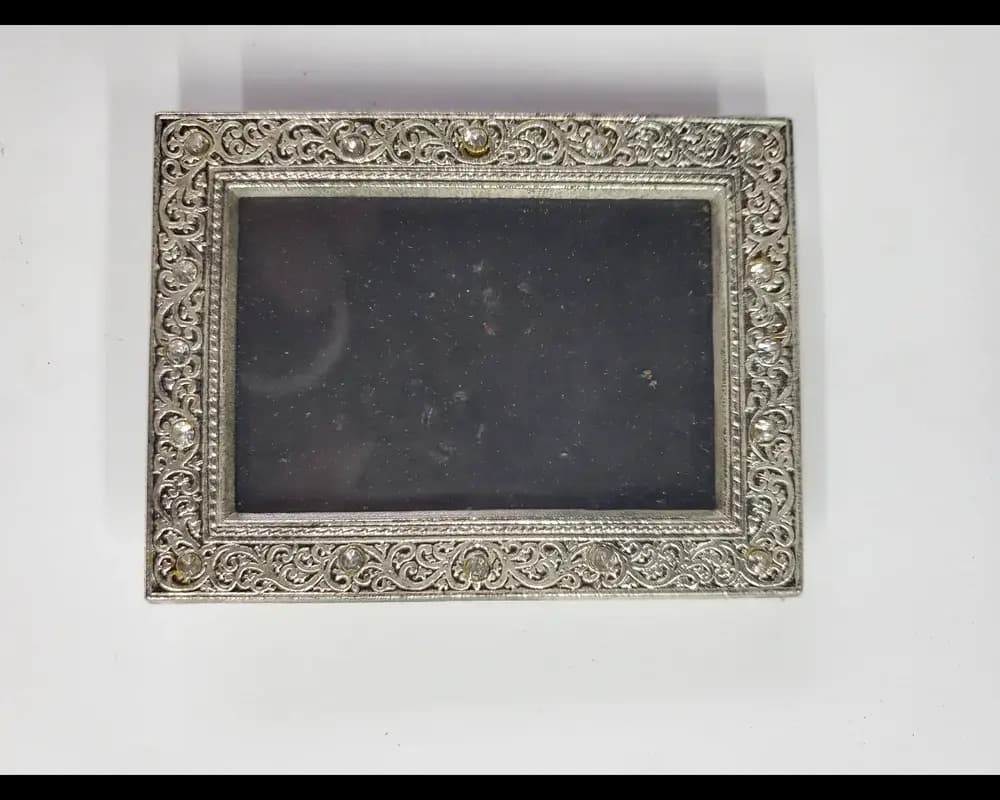 Ornate silver rhinestone picture frame